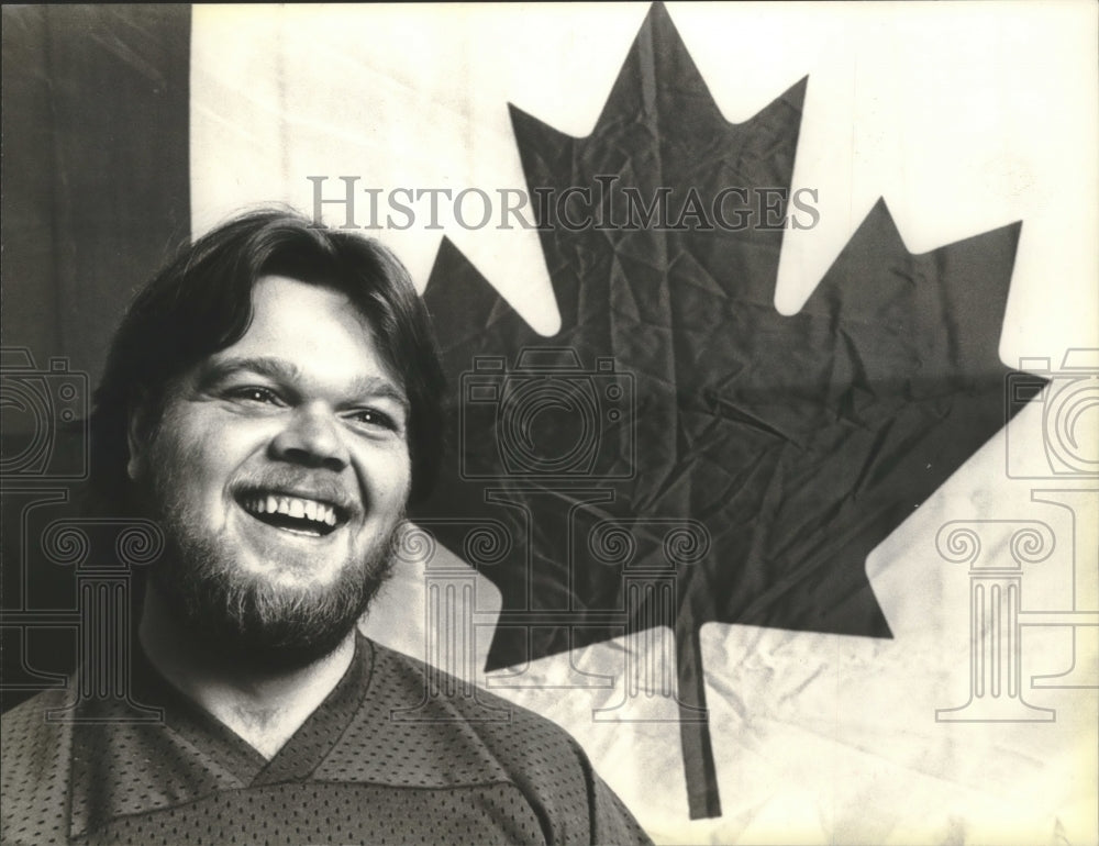 1980 Press Photo Hockey player Carey Haworth with Canadian flag. - mjt14242- Historic Images