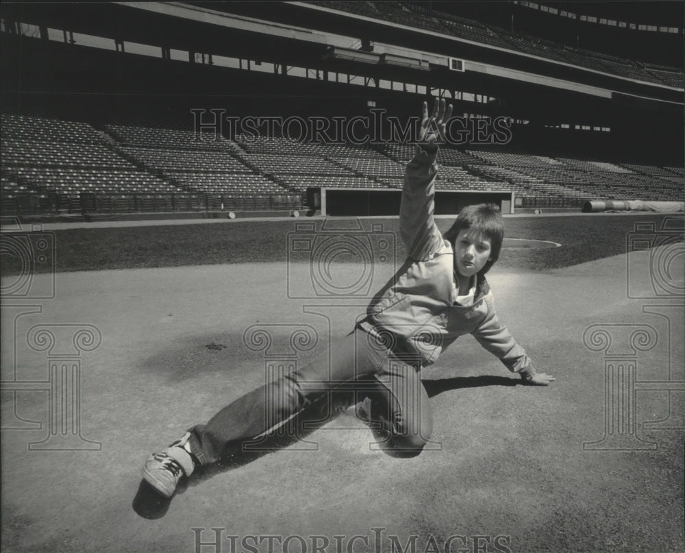 1984 Press Photo James Sikora,12, may be completing a fantasy sliding into home.- Historic Images