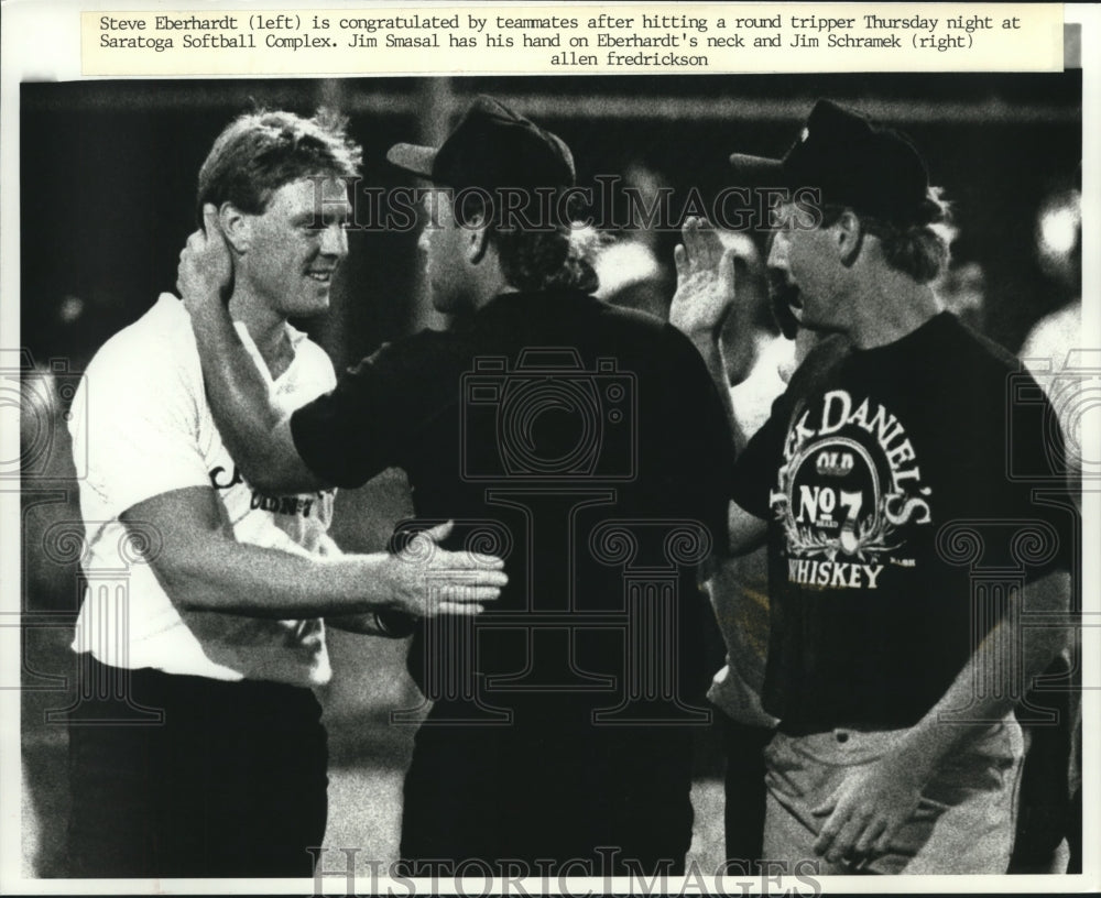 1990 Press Photo Steve Eberhardt congratulated by teammates after runs- Historic Images