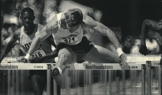1985 Press Photo Wisconsin's Track Runner Wayne Roby Clears Hurdle - mjt14691- Historic Images