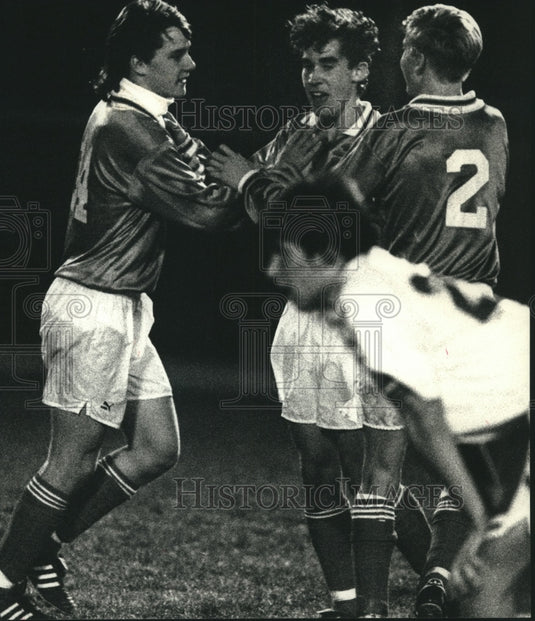1991 Press Photo Arrowhead's Schmidt gets congratulations after scoring .- Historic Images
