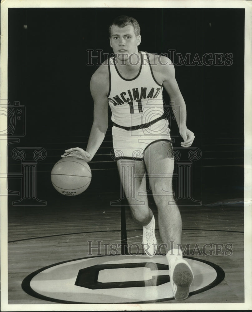 1966 Press Photo Cincinnati's Mike Rolf dribbling basketball down court.- Historic Images