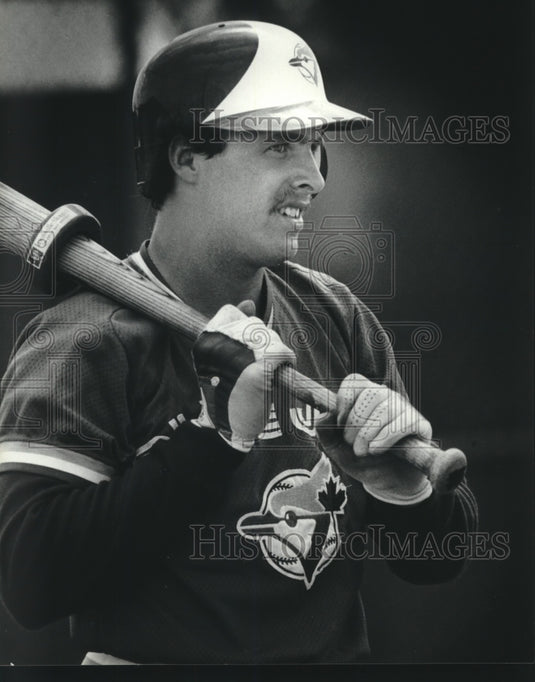 1985 Press Photo Blue Jays baseball player Augie Schmidt warms up his bat- Historic Images