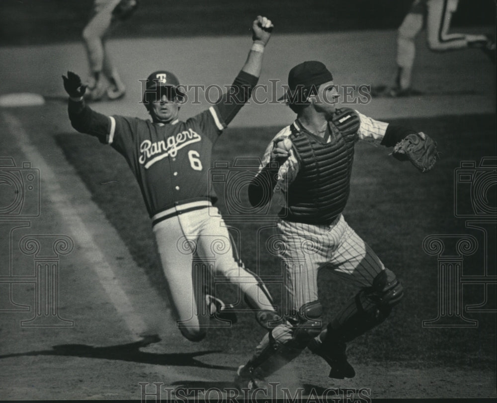 1984 Press Photo Ranger&#39;s Jones out at the plate as SundBerg throws to first- Historic Images