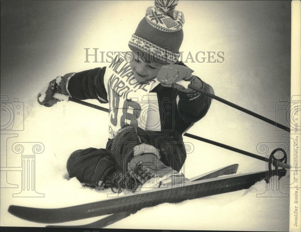 1985 Press Photo Young skier Jennifer Kunde of Wisconsin takes a fall- Historic Images