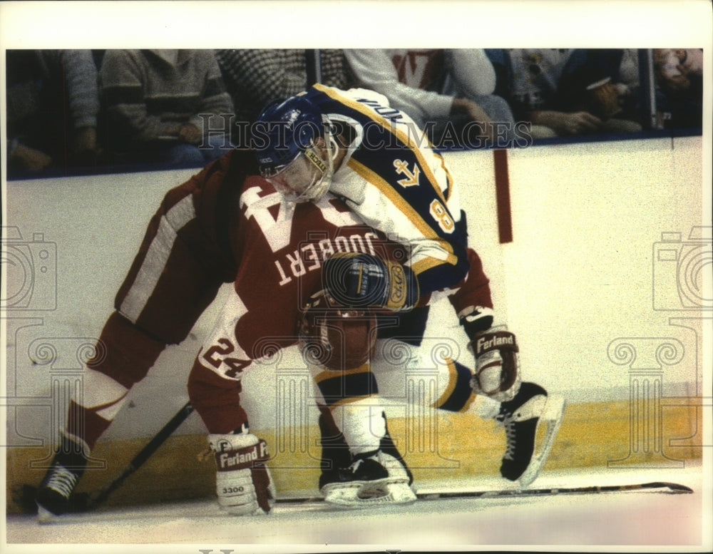 1993 Press Photo Mike Morin of LSS collides with Boston U's Jacques Joubert- Historic Images