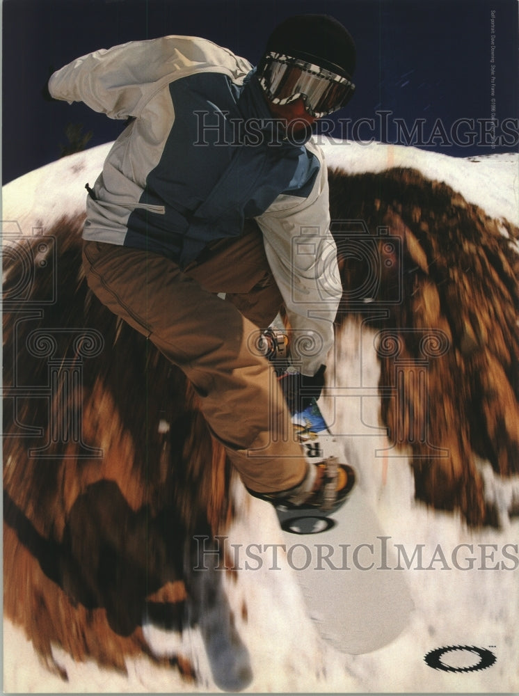 Press Photo Snowboarder jumps off a cliff - mjt17168- Historic Images