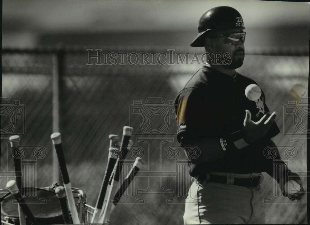 1994 Press Photo Greg Vaughn Milwaukee Brewers holding baseballs by bats.- Historic Images