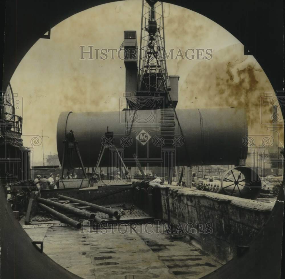 1961 Press Photo Cement mill is lifted onto a barge on Jones Island- Historic Images