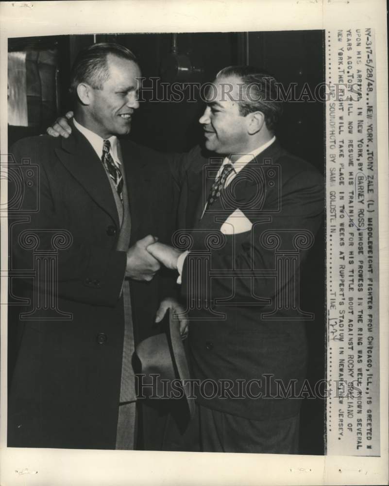 1948 Press Photo Boxer Tony Zale is greeted by Barney Ross in New York- Historic Images