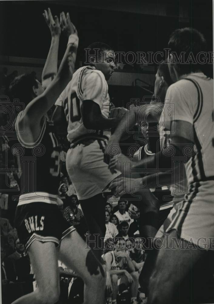 1988 Press Photo Action between Marquette and Rice basketball teams - mjt20809- Historic Images