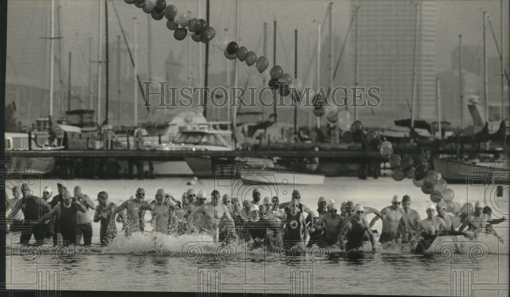 1988 Press Photo Triathlons include a swim, run, &amp; bike ride are held in summer.- Historic Images