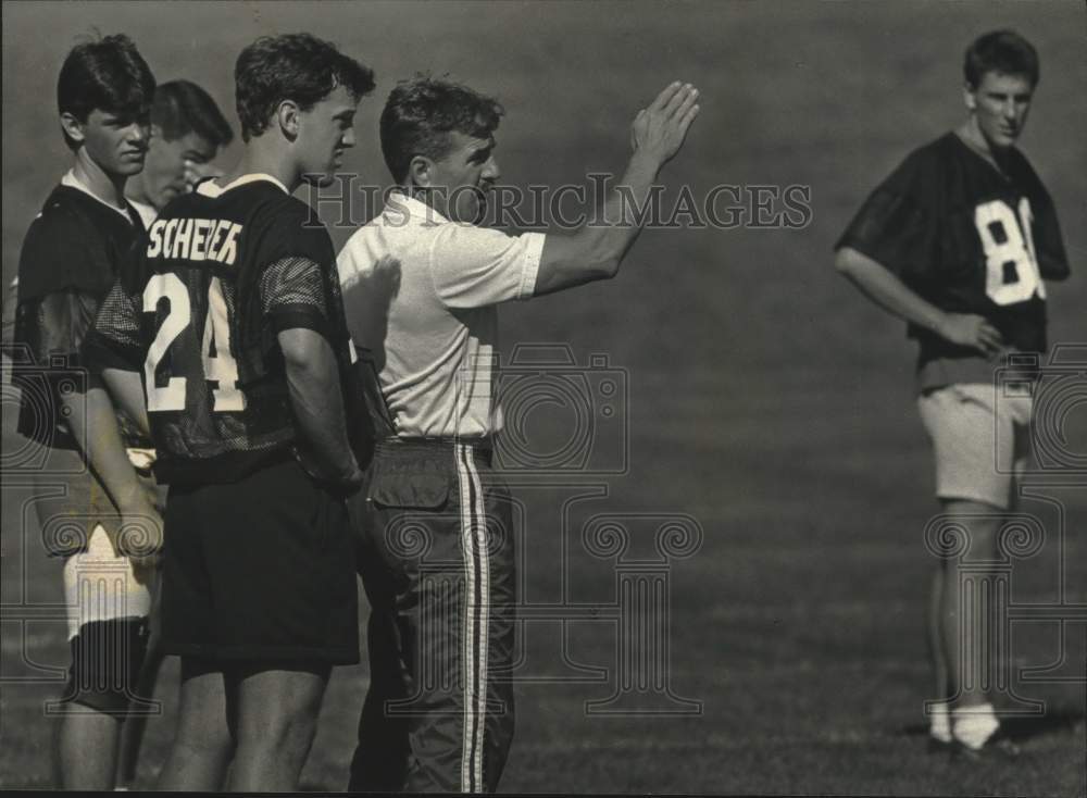 1990 Press Photo Waukesha South Coach Jeff Trickey gives instruction to players.- Historic Images