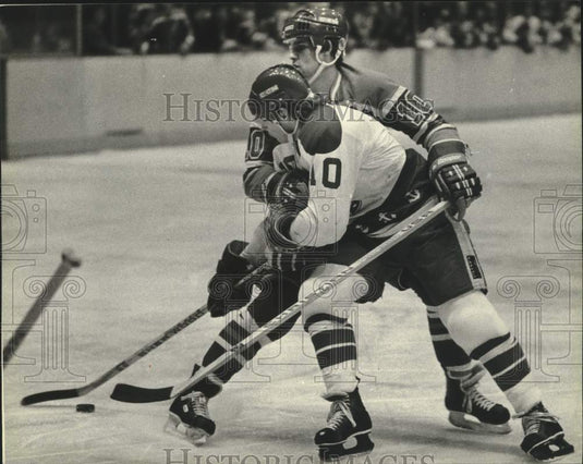 1983 Press Photo Komets' Bill Nichols wraps up Admirals' Chris Tanguay in action- Historic Images