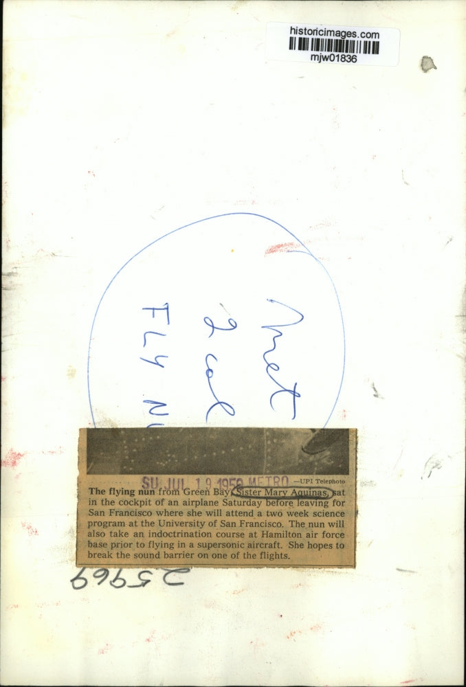 1959 Press Photo Sister Mary Aquinas waves from airplane that she will fly.