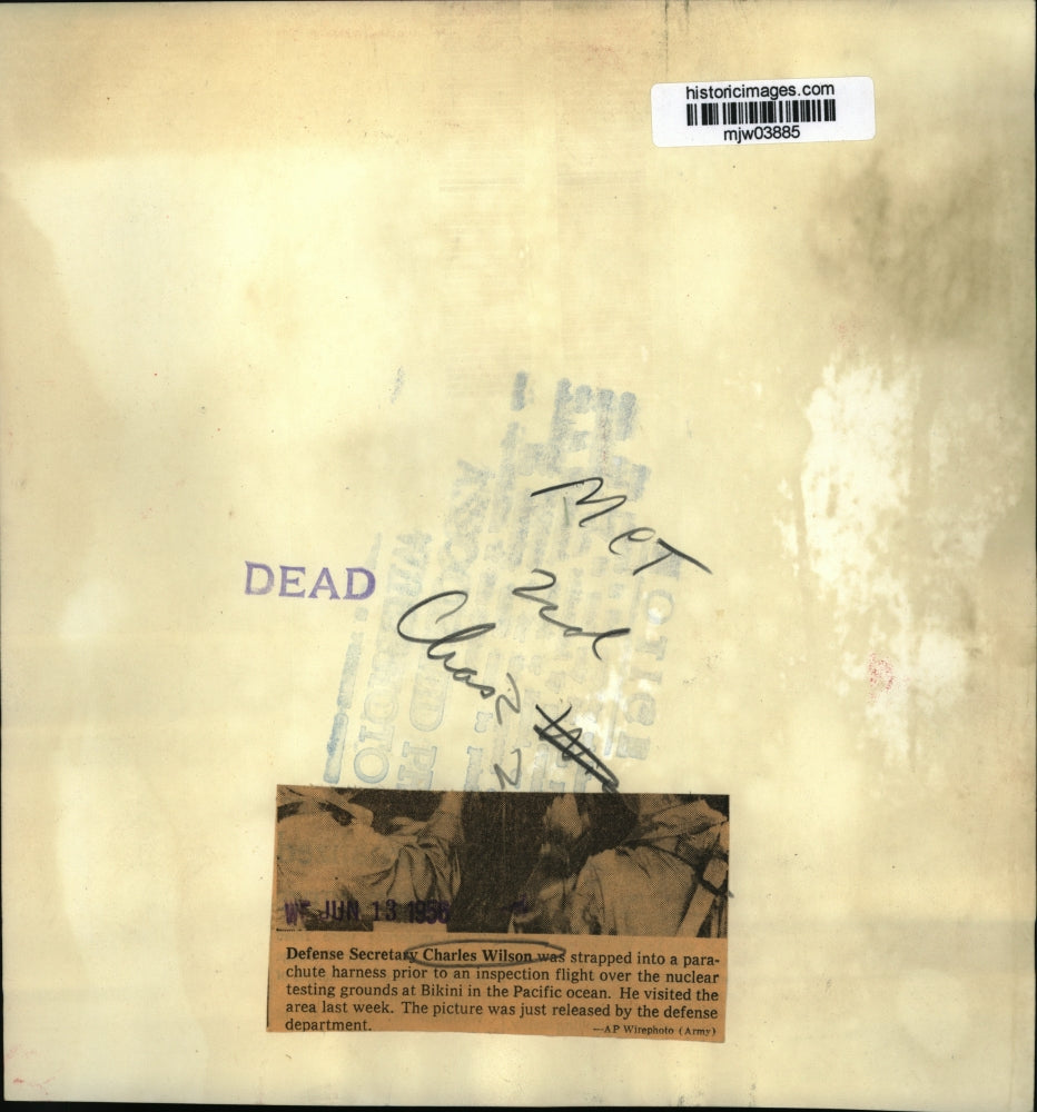 1956 Press Photo Defense Secretary Charles Wilson strapped in a parachute, HI