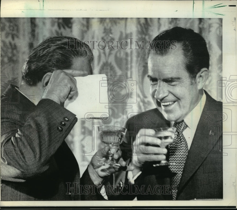 1973 Press Photo Leonid Brezhnev hides behind napkin after spilling champagne.- Historic Images