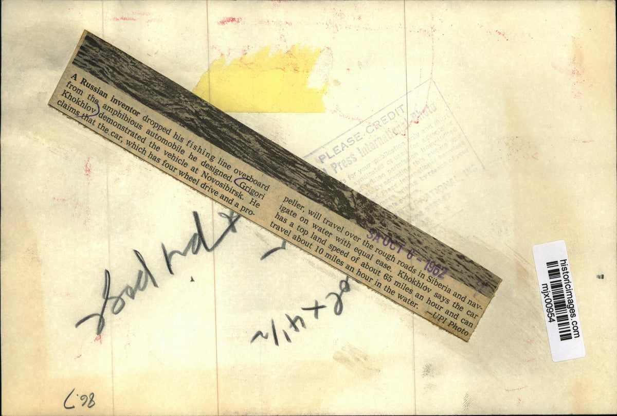 1962 Press Photo Grigori Khokhlov drops fishing line from automobile he designed