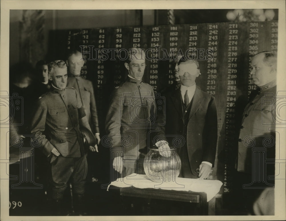 1927 Press Photo Secretary of War Baker, drawing the first capsule form a bowl- Historic Images