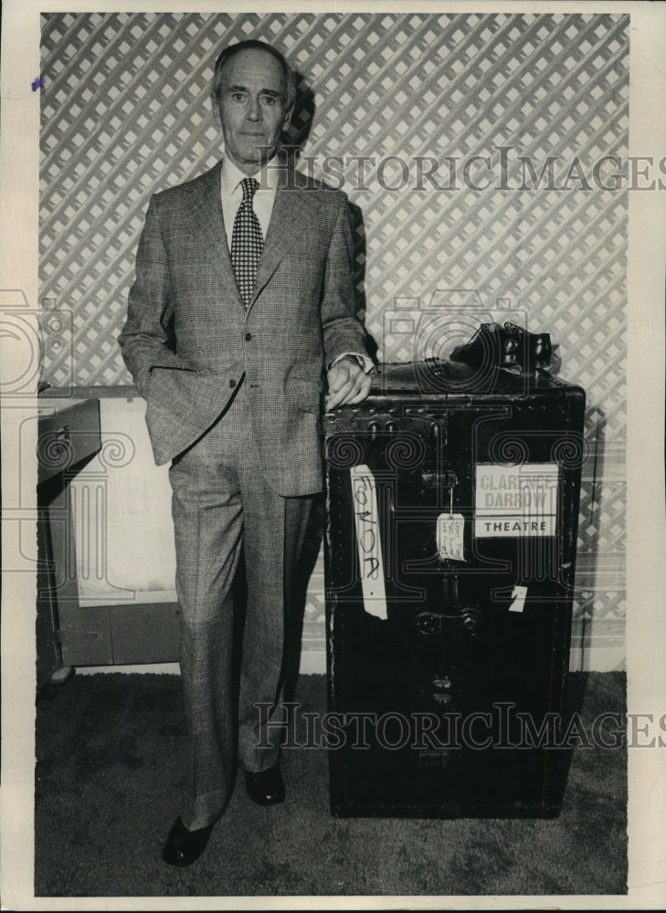 1975 Press Photo Henry Fonda standing next to trunk that holds his costume.- Historic Images
