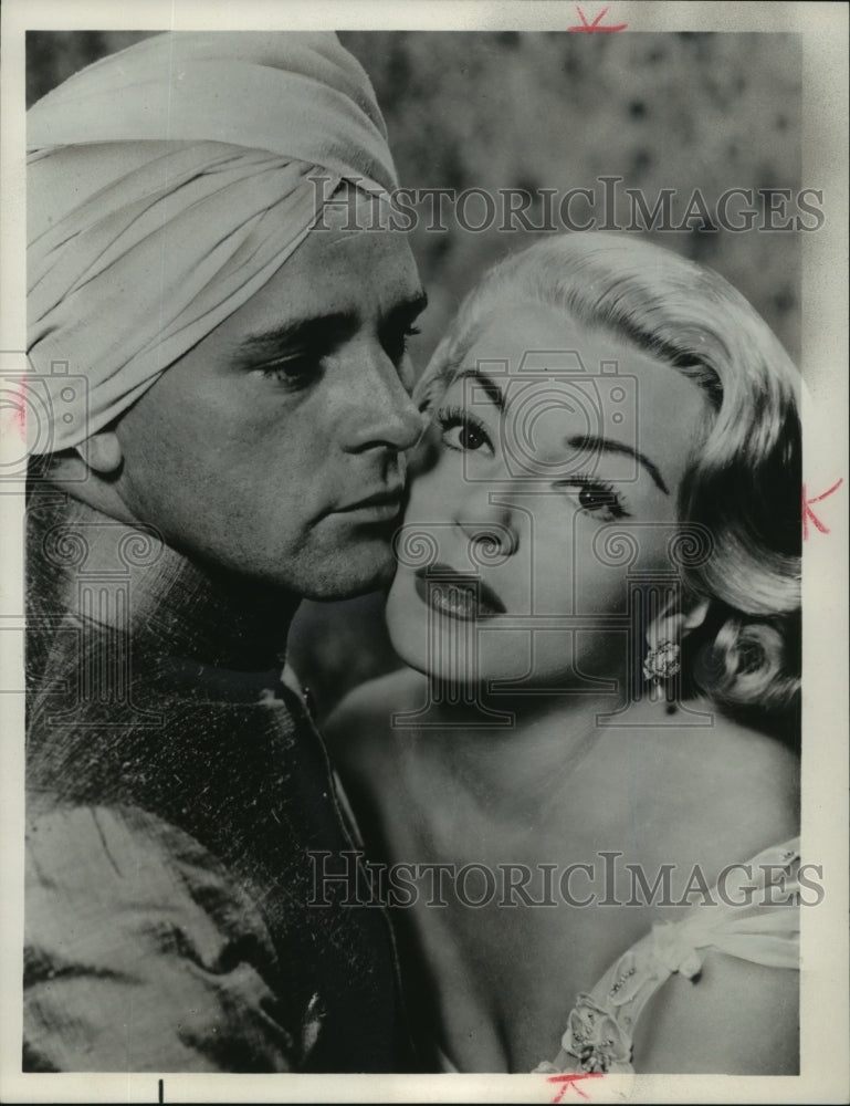1964 Press Photo Richard Burton and Lana Turner star in The Rains of Ranchipur.