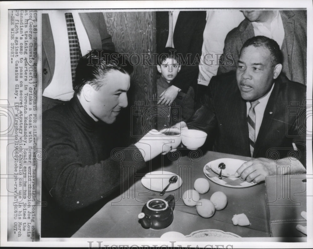 1966 Press Photo George Chuvalo drinks a toast with Joe Louis, boxers in Toronto- Historic Images