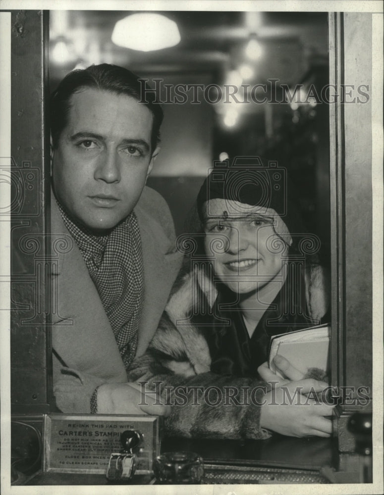 Load image into Gallery viewer, 1934 Press Photo Donald Cook and Maxine Lewis obtaining their marriage license
