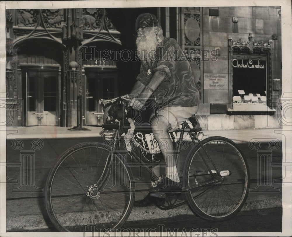 1953 Press Photo Tom Brown, 83 cycling to Chicago. - mjx21448