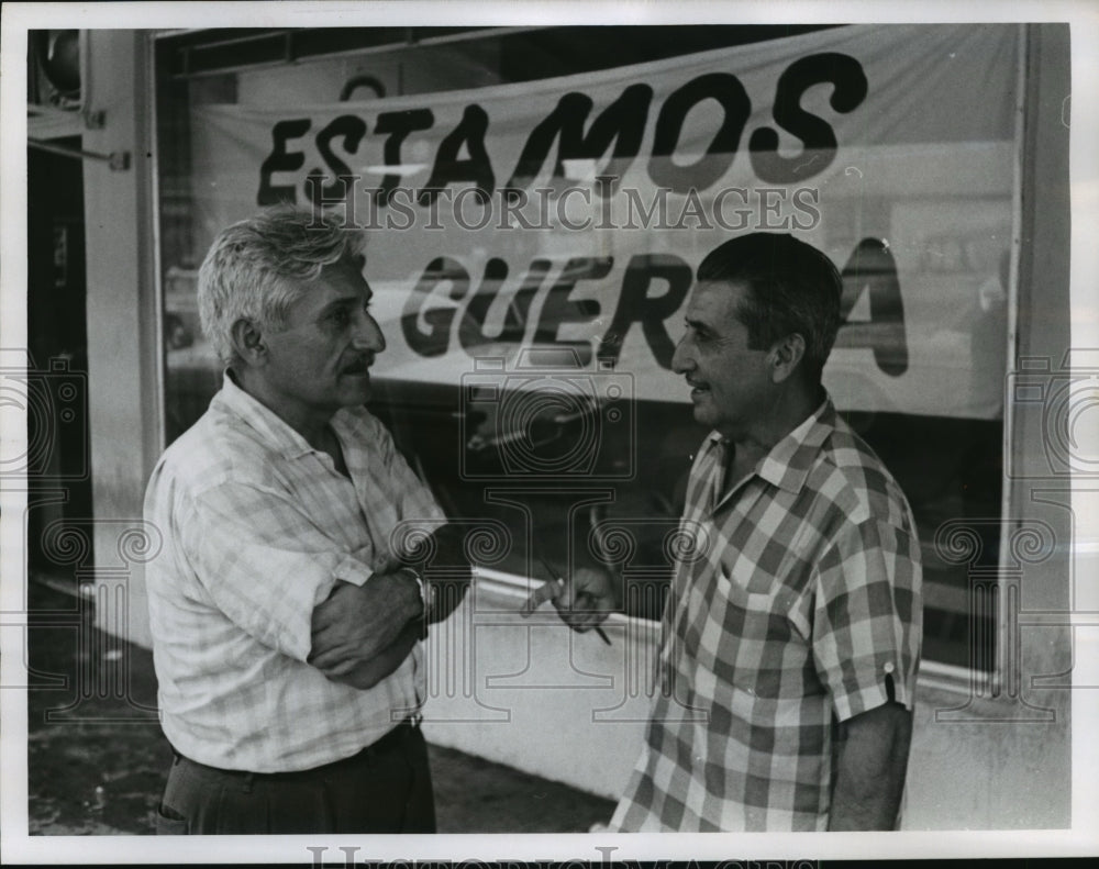 1964 Press Photo Andres And Aurelio Nazario Sargen-'We Are War Sign' Behind- Historic Images