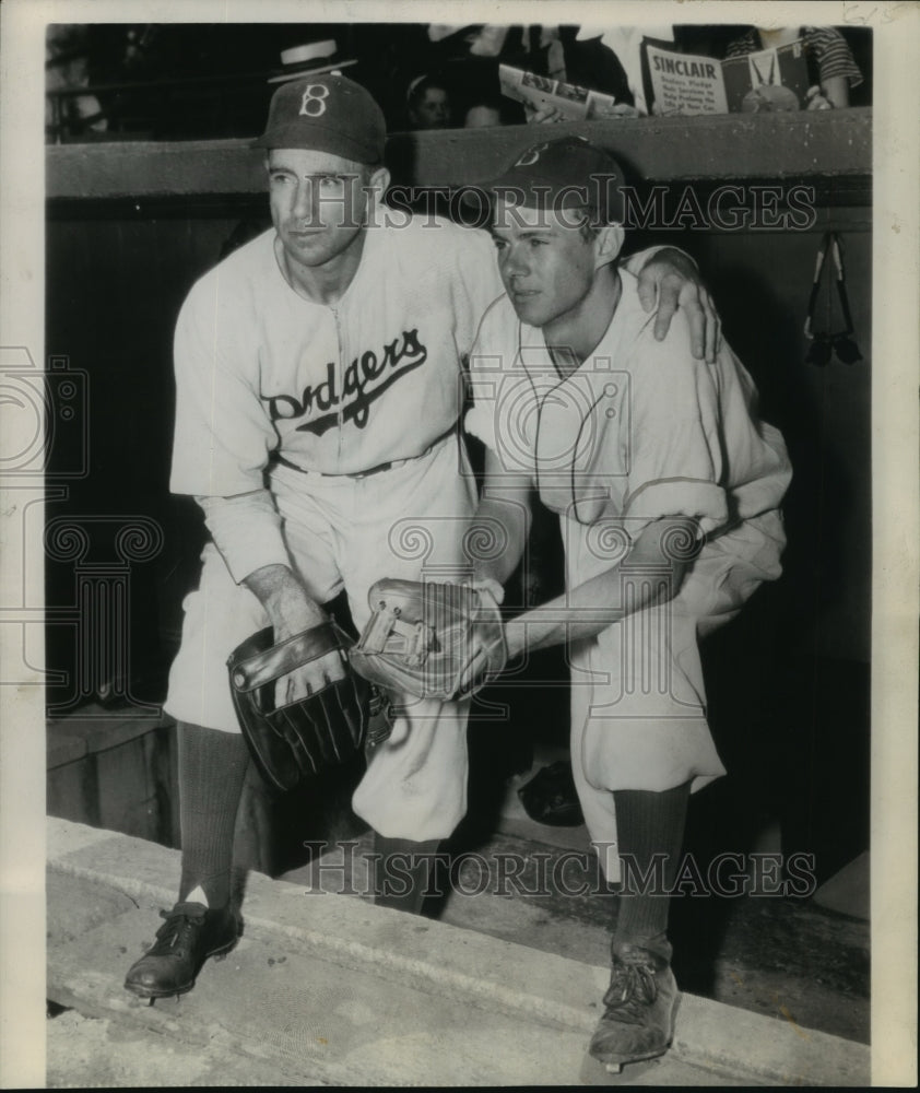 1943 Press Photo Johnny Cooney and his son, Jack, try out for Dodgers