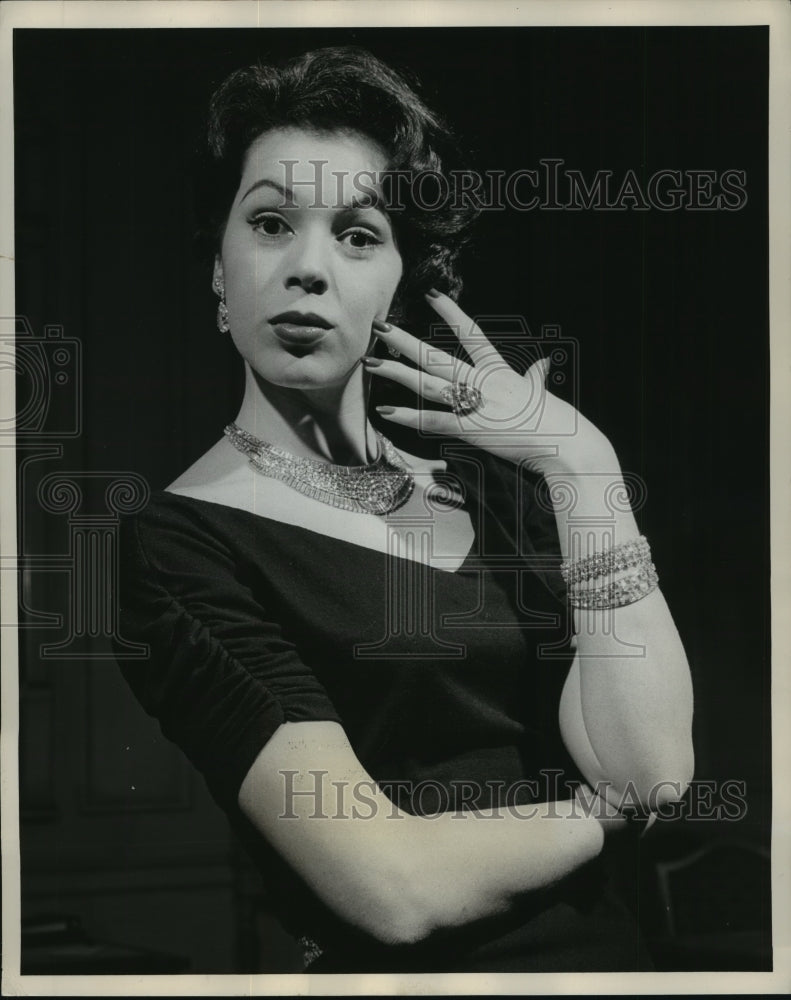 1957 Press Photo Model Jayne Hacklin in Almost One Million Dollars of Jewelry- Historic Images