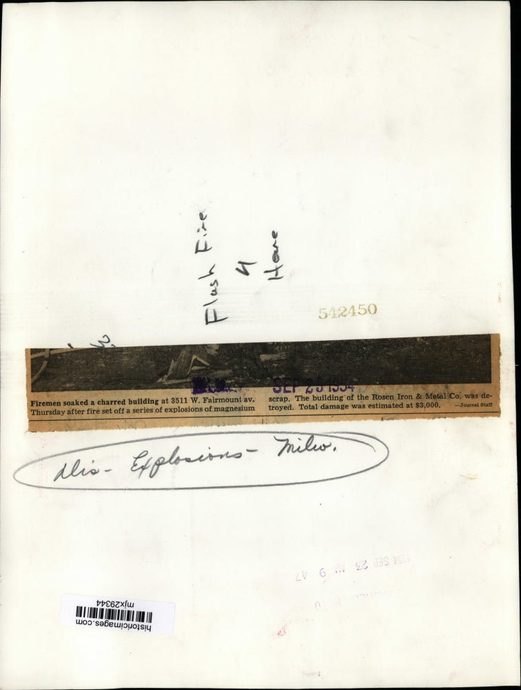 1954 Press Photo Firemen Soak a Charred Building After Explosion in Milwaukee