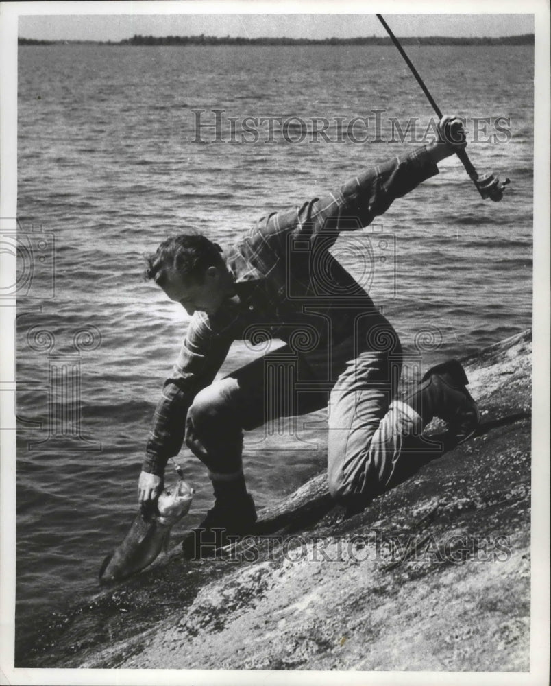 1958 Press Photo Journal Employee, Mel Ellis, fishing in Canada - mjx30178- Historic Images