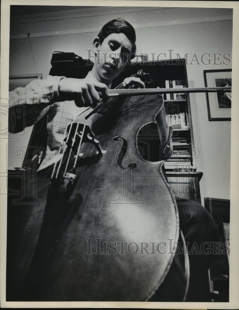 1969 Press Photo England's Prince Charles practicing the cello at Cambridge- Historic Images