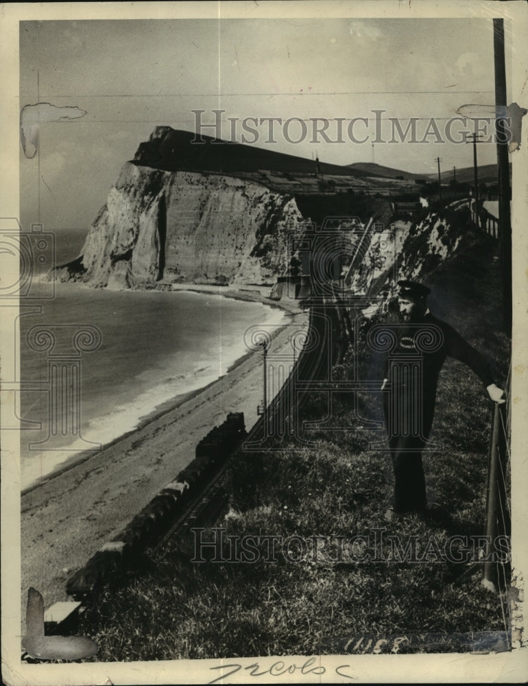 1926 Press Photo A man standing atop the cliffs of Dover, England - mjx33044- Historic Images