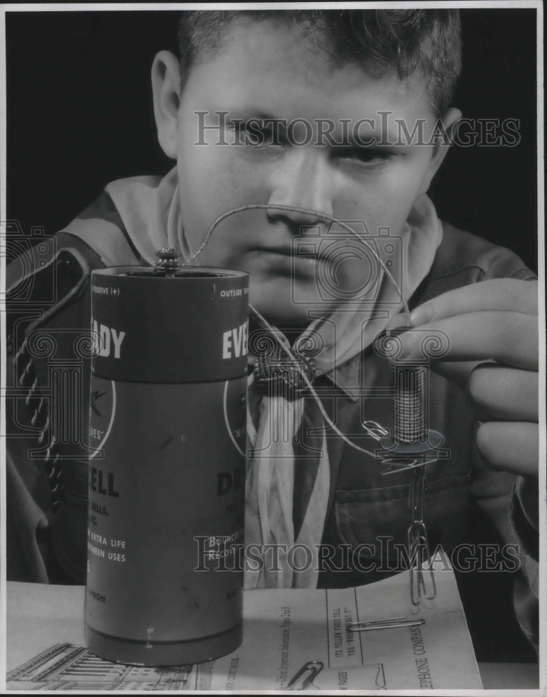 1955 Press Photo Boy Scout John Berndt Examines Electromagnet - mjx36692- Historic Images