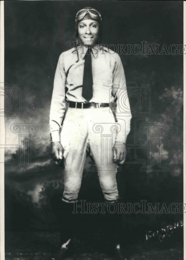 1988 Press Photo John Charles Robinson posed in flying gear for portrait.