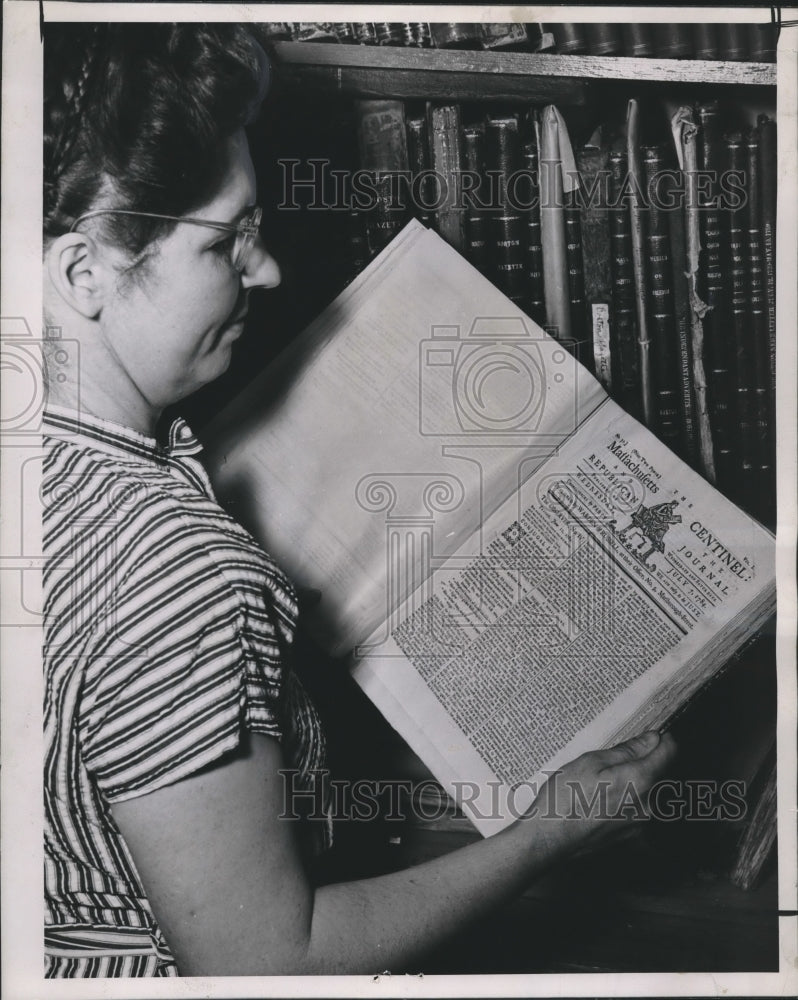 Load image into Gallery viewer, 1948 Press Photo Mrs. Robert Nelson hold Massachusetts Centinel, July 7, 1784
