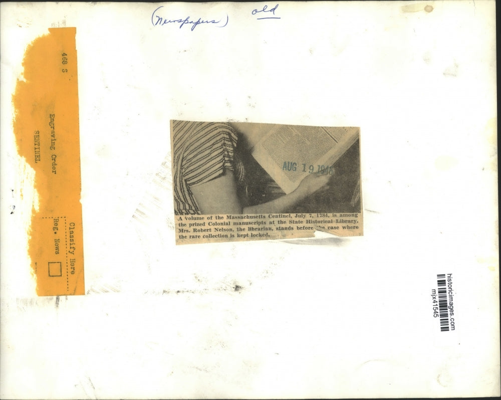 1948 Press Photo Mrs. Robert Nelson hold Massachusetts Centinel, July 7, 1784