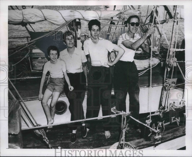 Load image into Gallery viewer, 1955 Press Photo Reynolds family on the Phoenix which they crossed the Pacific.
