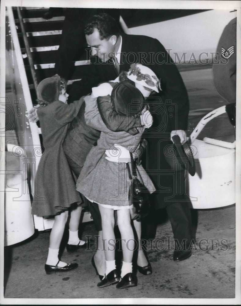Load image into Gallery viewer, 1955 Press Photo Mrs. Nixon hugs daughters upon return of Central American tour.
