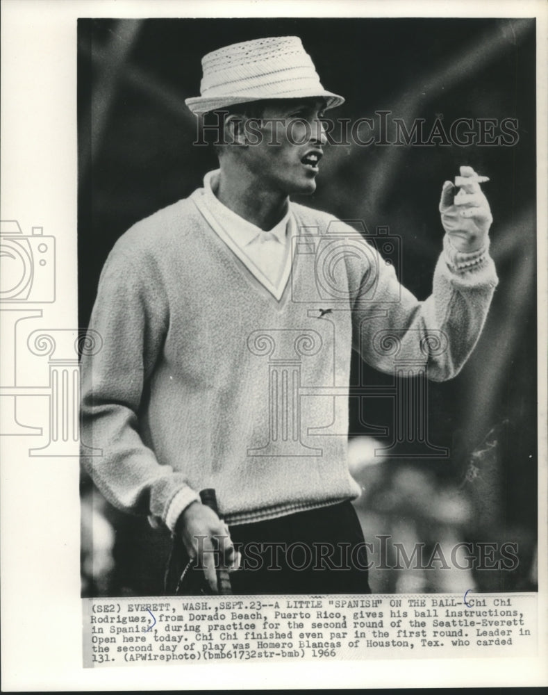 1966 Press Photo Chi Chi Rodriquez gives his ball instructions in Spanish.- Historic Images