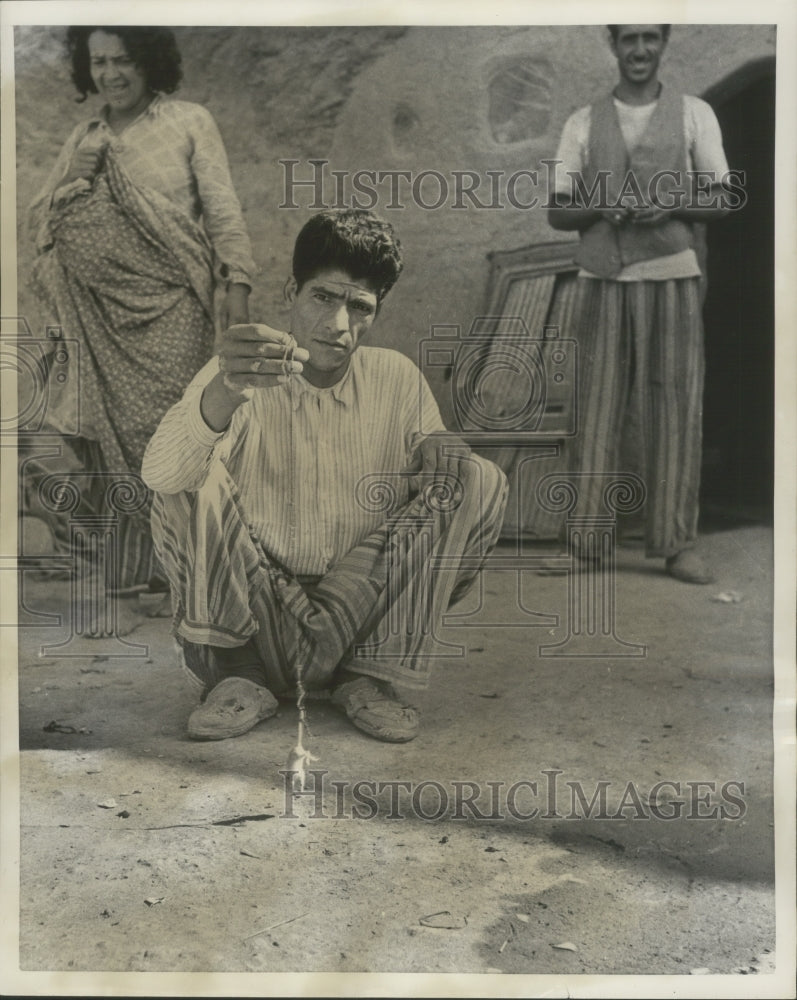 1951 Press Photo Man in front of Opium Den, Tehran, Iran- Historic Images