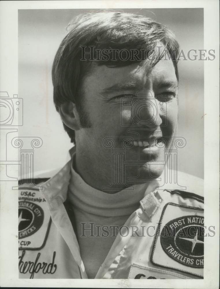 1977 Press Photo Johnny Rutherford before the running of the 61st Indy 500- Historic Images