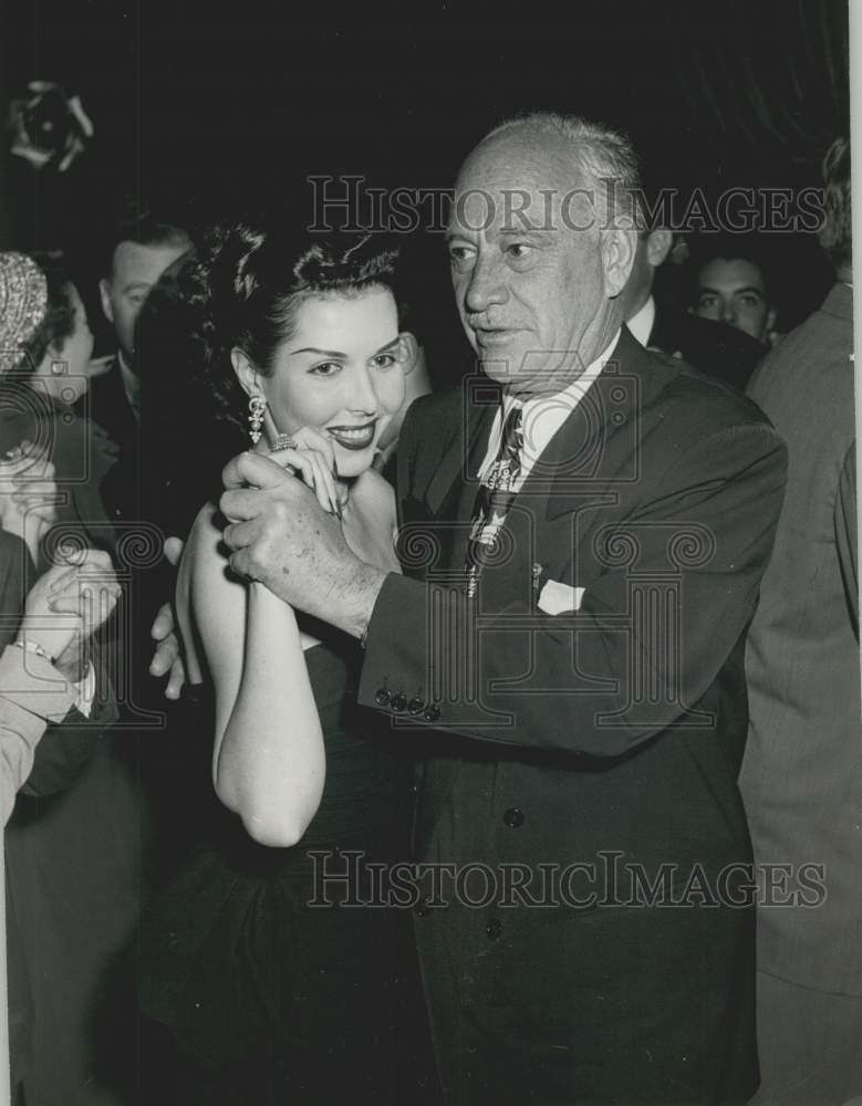 1950 Press Photo Conrad Hilton dances with Ann Miller in Hollywood. - mjx50259- Historic Images
