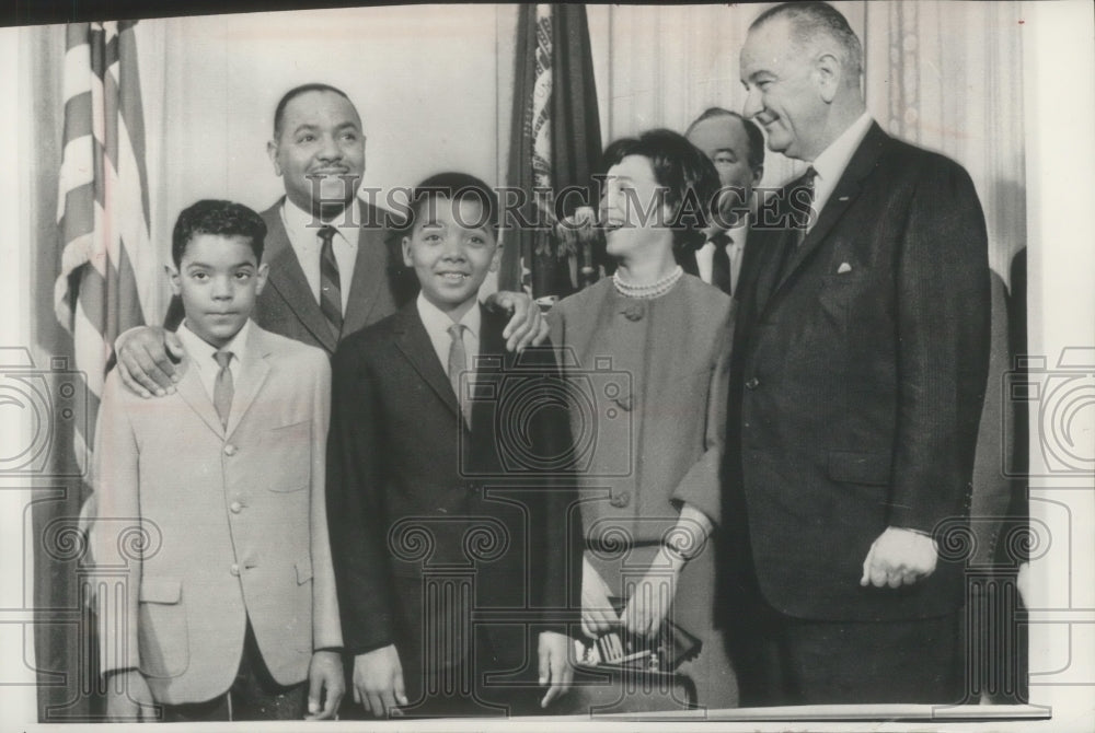 1964 Press Photo Carl T. Rowan and his family with President Johnson.- Historic Images