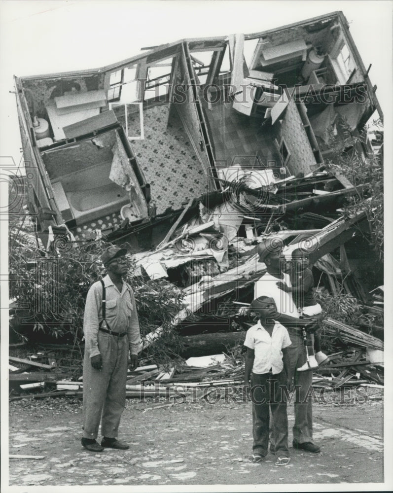 1961 Press Photo Family Stands in Front of Destroyed House-Hurricane Carla- Historic Images