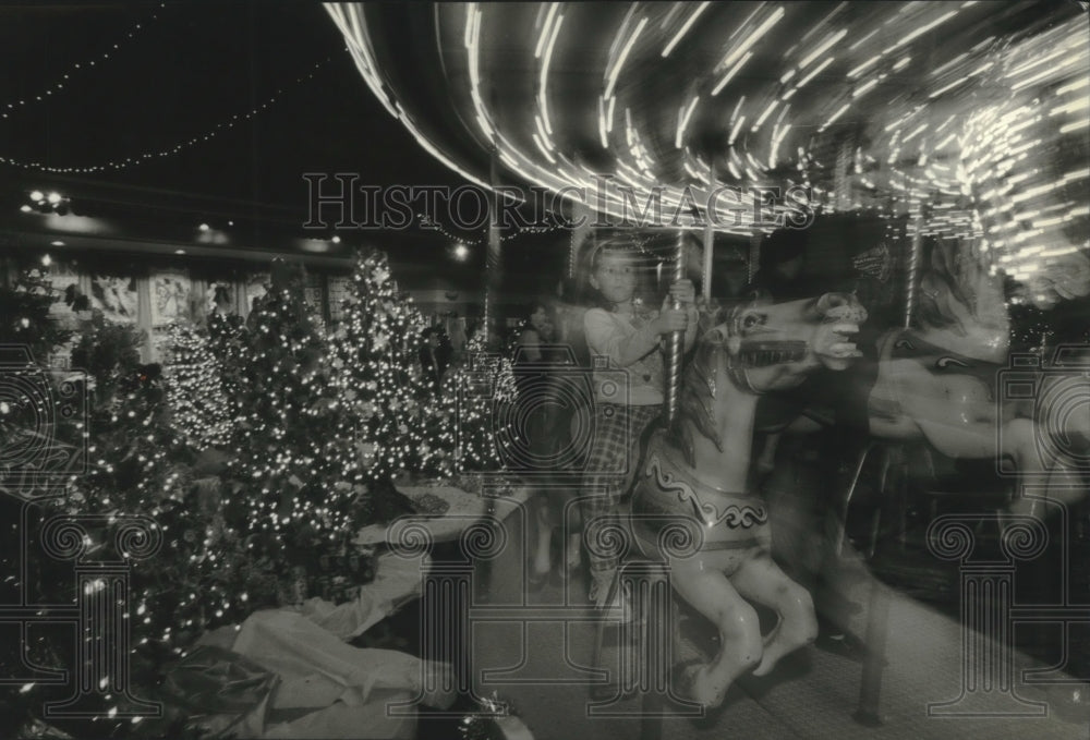 1994 Press Photo A Christmas Carousel is the theme of Racine Festival of Trees.- Historic Images