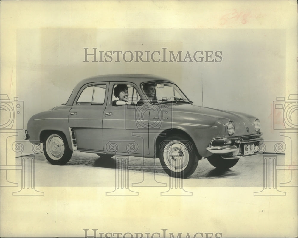 1959 Press Photo Couple posing in a 1959 Renault Dauphine - mjx57574- Historic Images