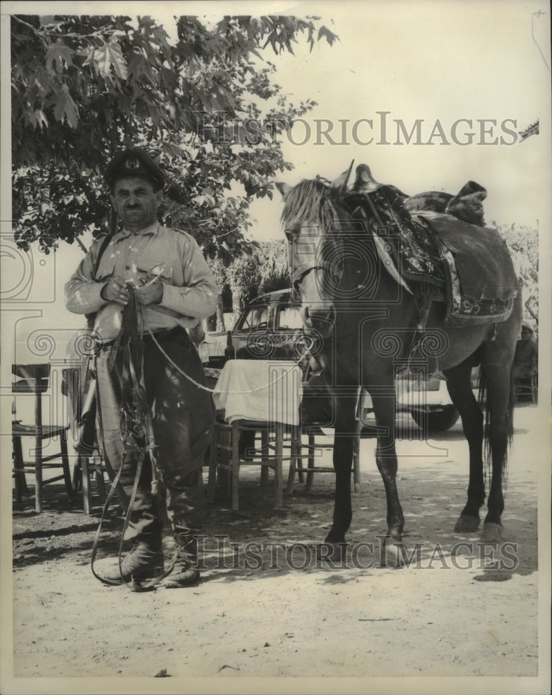 1958 Press Photo Policeman and His Horse Rest in the Shade in Antalya, Turkey- Historic Images